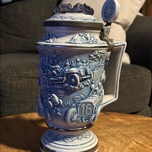 Avon Blue and Gray Ceramic Racing Stein